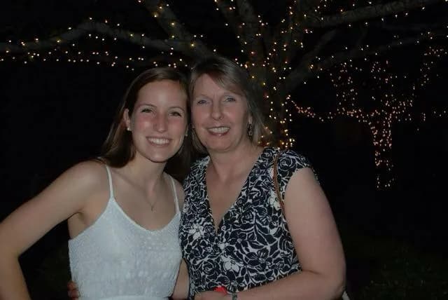 Kelly with her mom, a family photo from her childhood.